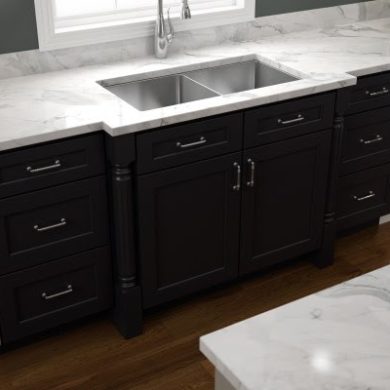 Two-tone kitchen with soft white cabinets and charcoal sink base - 1to1 Kitchen & Bath design in Connecticut